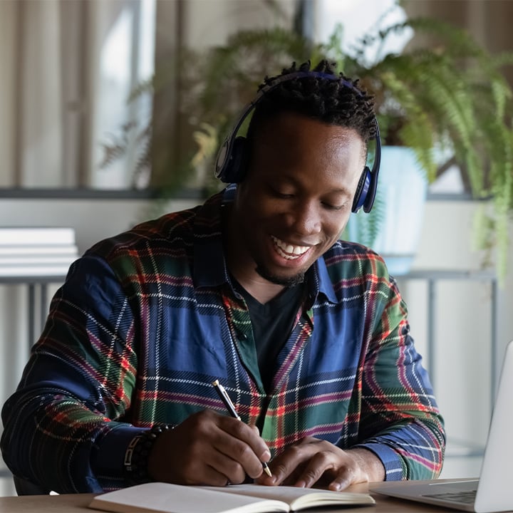 Man working on a laptop at a desk